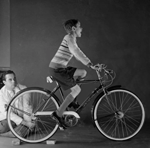 <b class=qtipBold><figcaption>Advertisement for Triumph bicycles</figcaption></b><br>Advertisement for Triumph bicycles -- boy model (David Scully). 1959<br><em>© The Colin Sherborne Collection/Mary Evans Picture Library</em> Advertisement for Triumph bicycles