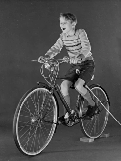 <b class=qtipBold><figcaption>Advertisement for Triumph bicycles</figcaption></b><br>Advertisement for Triumph bicycles -- boy model (David Scully). 1959<br><em>© The Colin Sherborne Collection/Mary Evans Picture Library</em> Advertisement for Triumph bicycles