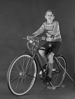 <b class=qtipBold><figcaption>Advertisement for Triumph bicycles</figcaption></b><br>Advertisement for Triumph bicycles -- boy model (David Scully). 1959<br><em>© The Colin Sherborne Collection/Mary Evans Picture Library</em> Advertisement for Triumph bicycles
