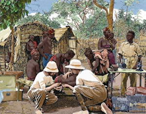 Africa. European doctors examining a native attacked by slee Africa. European doctors examining a native attacked by slee