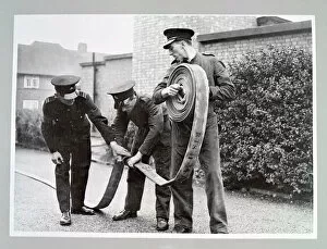 Training Gallery: AFS volunteers undergoing hose drill, WW2