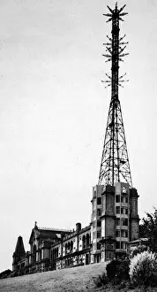 Print of Alexandra Palace, a large building with a prominent mast and transmitting aerials