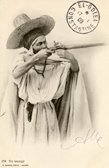 Algeria - An Insurgent aiming his rifle Algeria - An Insurgent aiming his rifle