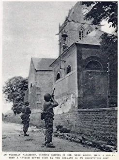 American paratroop, hunting snipers in St. Mere Eglise, firing a volley into a church American paratroop, hunting snipers in St. Mere Eglise, firing a volley into a church