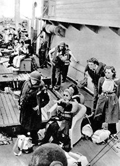 American Red Cross Workers watch a U-boat battle; Second Wor American Red Cross Workers watch a U-boat battle; Second Wor