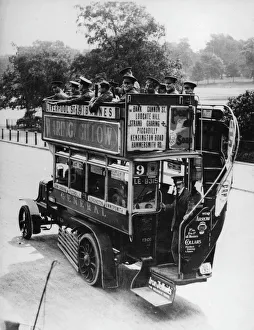 <b class=qtipBold><figcaption>Ammunition Bus, First World War</figcaption></b><br>Motor bus loaded with ammunition and well guarded leaving the magazine in Hyde Park during World War I<br><em>© Mary Evans/Robert Hunt Collection</em> Ammunition Bus, First World War