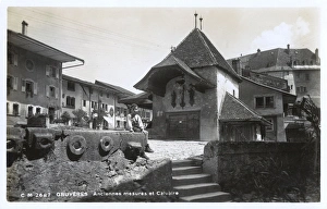 Ancient Grain Measures and Calvary at Gruyeres, Switzerland Ancient Grain Measures and Calvary at Gruyeres, Switzerland