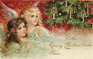 <b class=qtipBold><figcaption>Angels Admire Tree</figcaption></b><br>Two angels admire the decorated tree<br><em>© Mary Evans Picture Library</em> Angels Admire Tree