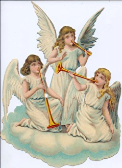 Angels with trumpets on a Victorian Christmas scrap Angels with trumpets on a Victorian Christmas scrap