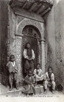 Arab children in a house doorway, Algiers, Algeria Arab children in a house doorway, Algiers, Algeria