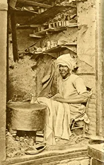 Arab cobbler at work in his shop, Cairo, Egypt Arab cobbler at work in his shop, Cairo, Egypt