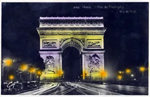 The Arc de Triomphe, Paris, France - photographed at night. Date: circa 1930s The Arc de Triomphe, Paris, France - photographed at night. Date: circa 1930s