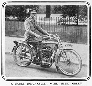 An army officer sits astride a Silent Grey Harley Davidson An army officer sits astride a Silent Grey Harley Davidson