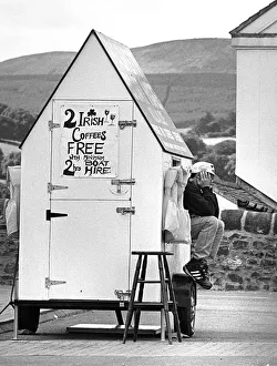 Bored Gallery: Attendant sits on mobile Boat Hire ticket office, Killaloe