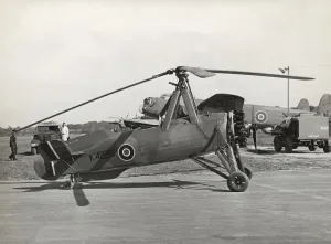 Prints of Cierva C.30A Avro 671 Rota Mk-1 Parked with a Lancaster Behind Date: 1934 Aviation Prints: Cierva C.30A Avro 671 Rota Mk-1 Print, 1934