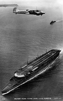 Avro Anson I K6206 flying over HMS Furious Avro Anson I K6206 flying over HMS Furious