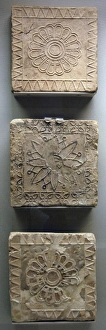 Babylon. Terracotta tiles decorated in floral motifs. Dated Babylon. Terracotta tiles decorated in floral motifs. Dated