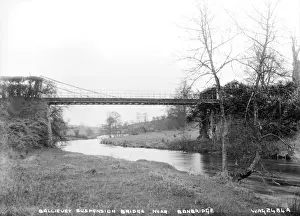 Prints of Ballievey Suspension Bridge near Banbridge - a view of a bridge over the river. (Location: Northern Ireland; County Down; Banbridge). Date: circa early 1900s River Prints: Early 1900s Print of Ballievey Suspension Bridge