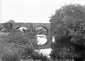 Prints of Ballinderry River - a view of the river and a bridge across it. (Location: Northern Ireland; County Antrim; Ballinderry). Date: circa early 1900s River Prints: Ballinderry River Print - Northern Ireland circa early 1900s