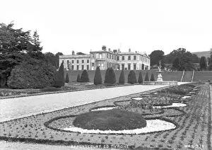 Prints of Baronscourt, Co Tyrone - a view of Baronscourt House from the formal garden. (Location: Northern Ireland: County Tyrone: Baronscourt). Date: circa early 1900s County Tyrone Prints: Baronscourt House Print - Northern Ireland circa early 1900s