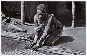 Weaving Gallery: A Basotho woman making mats - South Africa