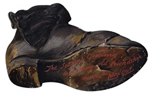 Battered old boot-shaped Christmas card Battered old boot-shaped Christmas card