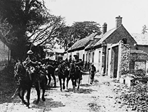 <b class=qtipBold><figcaption>Battle of Amiens 1918</figcaption></b><br>British cavalry passing through Beaucourt-en-Santerre to attack Le Quesnel at the Battle of Amiens on the Western Front in France during World War I in August 1918<br><em>© Mary Evans/Robert Hunt Collection</em> Battle of Amiens 1918