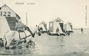 A beach scene from Ostend, Belgium - Bathing huts on wheels A beach scene from Ostend, Belgium - Bathing huts on wheels