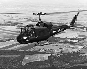 <b class=qtipBold><figcaption>Bell 204 UH-1E Huey</figcaption></b><br>Usmc Bell 204 UH-1E Huey Date: 1960s<br><em>© aviation-images.com / Mary Evans Picture Library</em> Bell 204 UH-1E Huey