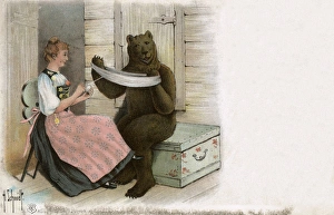 The Bern Bear helps a Swiss woman with her yarn winding The Bern Bear helps a Swiss woman with her yarn winding