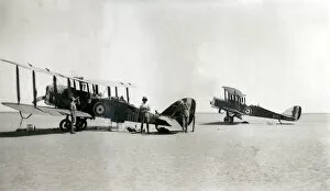 Resting Collection: Two biplanes with resting crew, Iraq