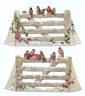 Birds perched on gates on two cutout Christmas cards Birds perched on gates on two cutout Christmas cards