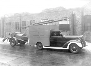 Blitz in London -- Auxiliary towing vehicle and trailer, WW2 Blitz in London -- Auxiliary towing vehicle and trailer, WW2