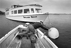 Boatman with Rutland Water pleasure cruiser, Rutland Belle Boatman with Rutland Water pleasure cruiser, Rutland Belle