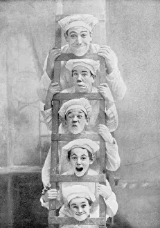 <b class=qtipBold><figcaption>The Boganny Troupe</figcaption></b><br>The Boganny Troupe, otherwise known as 'The Lunatic Bakers'. The five members rest their chins on the rungs of a ladder and pull faces for the camera<br><em>© Mary Evans Picture Library</em> The Boganny Troupe