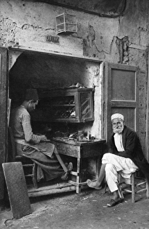 Bootmaker at work, Jaffa, Western Israel Bootmaker at work, Jaffa, Western Israel