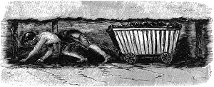 Investigation Gallery: Boy dragging coal wagon with harness and chain in mine