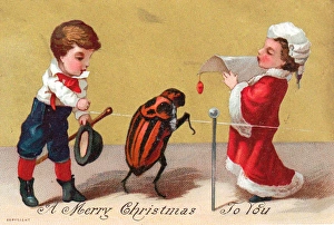 Boy and girl with large ladybird on a Christmas card Boy and girl with large ladybird on a Christmas card