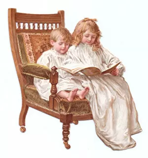 Upholstery Gallery: Boy and girl reading on a chair-shaped greetings card