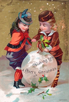 Boy and girl with snowball on a Christmas card Boy and girl with snowball on a Christmas card