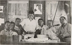 Boy scouts washing cutlery at camp, British Honduras Boy scouts washing cutlery at camp, British Honduras