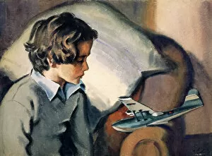 Images Dated 3rd February 2012: Boy and toy aeroplane by David Wright