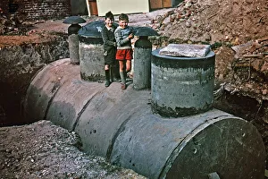 Two boys explore nuclear fallout shelter, Deal, Kent Two boys explore nuclear fallout shelter, Deal, Kent