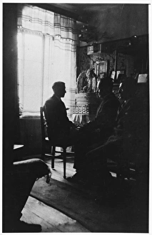 <b class=qtipBold><figcaption>Braunau Seance Room</figcaption></b><br>Austrian medium Rudi Schneider with investigators in the seance room at the Schneider home, Braunau.<br><em>© Mary Evans Picture Library 2015 - https://copyrighthub.org/s0/hub1/creation/maryevans/MaryEvansPictureID/10196980</em> Braunau Seance Room