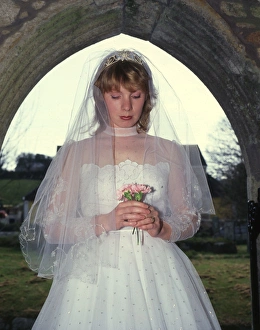 Bride in church doorway, Marazion, Cornwall Bride in church doorway, Marazion, Cornwall