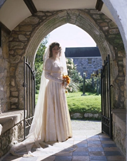 Bride in church porch, Marazion, Cornwall Bride in church porch, Marazion, Cornwall