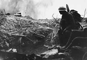 <b class=qtipBold><figcaption>British Front 1915</figcaption></b><br>A soldier in a shell crater on the British Front Line on the Western Front in France during World War I in 1915<br><em>© Mary Evans/Robert Hunt Collection</em> British Front 1915