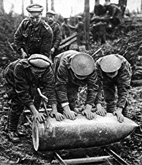 British Artillerymen with a large shell; First World War, 19 British Artillerymen with a large shell; First World War, 19