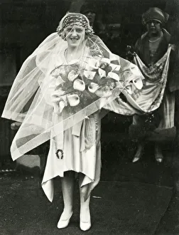 A British Bride with veil, bouquet and train A British Bride with veil, bouquet and train