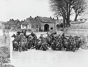 <b class=qtipBold><figcaption>British cavalry 1917</figcaption></b><br>British cavalry standing in water on horses in a ruined town in France on the British front during World War I in 1917<br><em>© Mary Evans/Robert Hunt Collection</em> British cavalry 1917